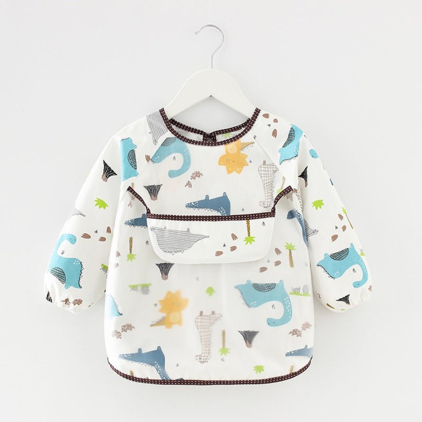 présentation du bavoir bébé manche longue imperméable modèle dinosaures