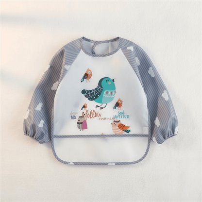 Bavoir imperméable à manches longues coloris gris motif oiseaux