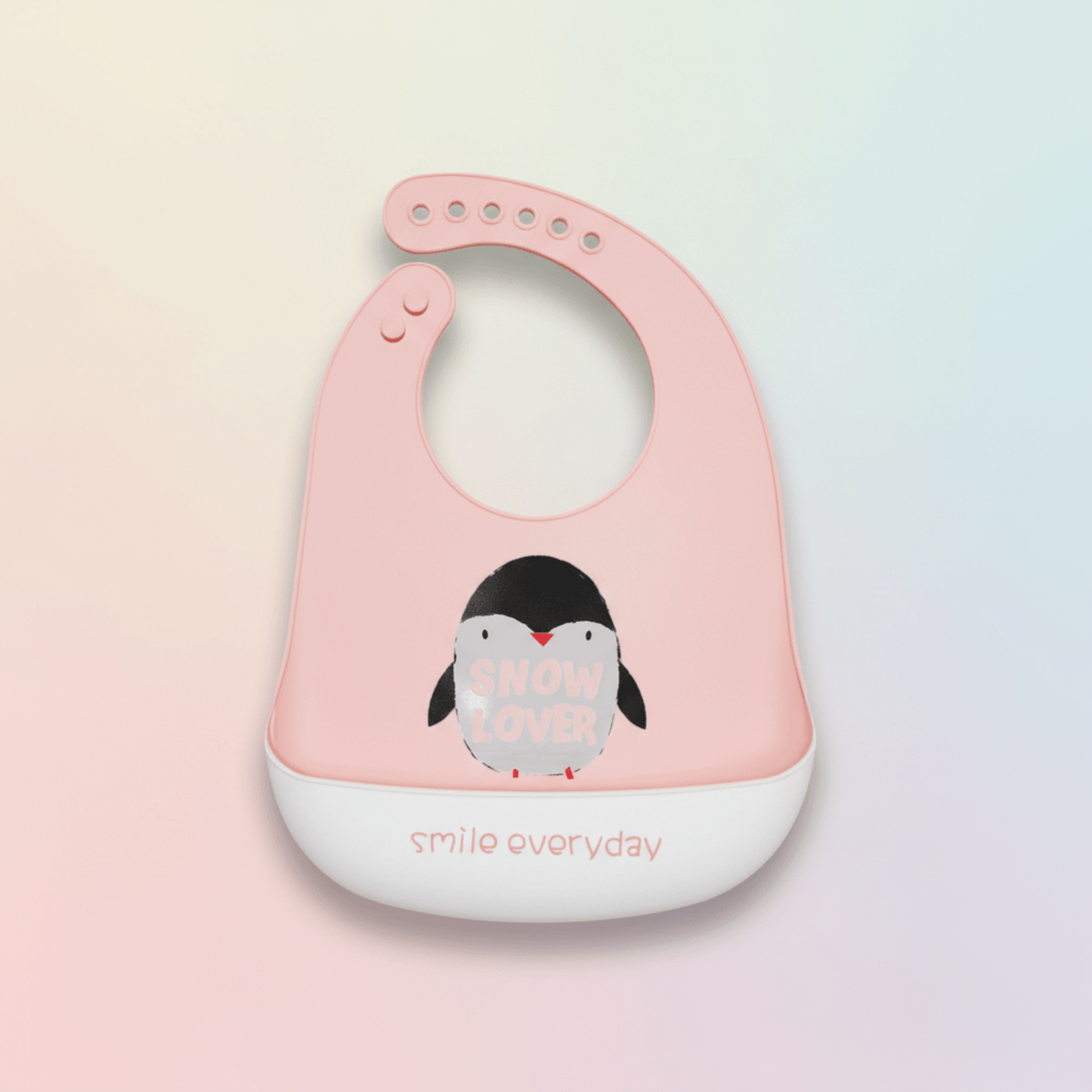 bavoir impermeable silicone rose motif pingouin avec anotation smile everyday sur le revers de la poche récupératrice