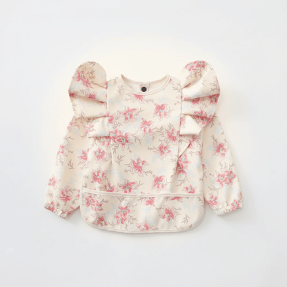 bavoir manche longue coloris blanc motif floral