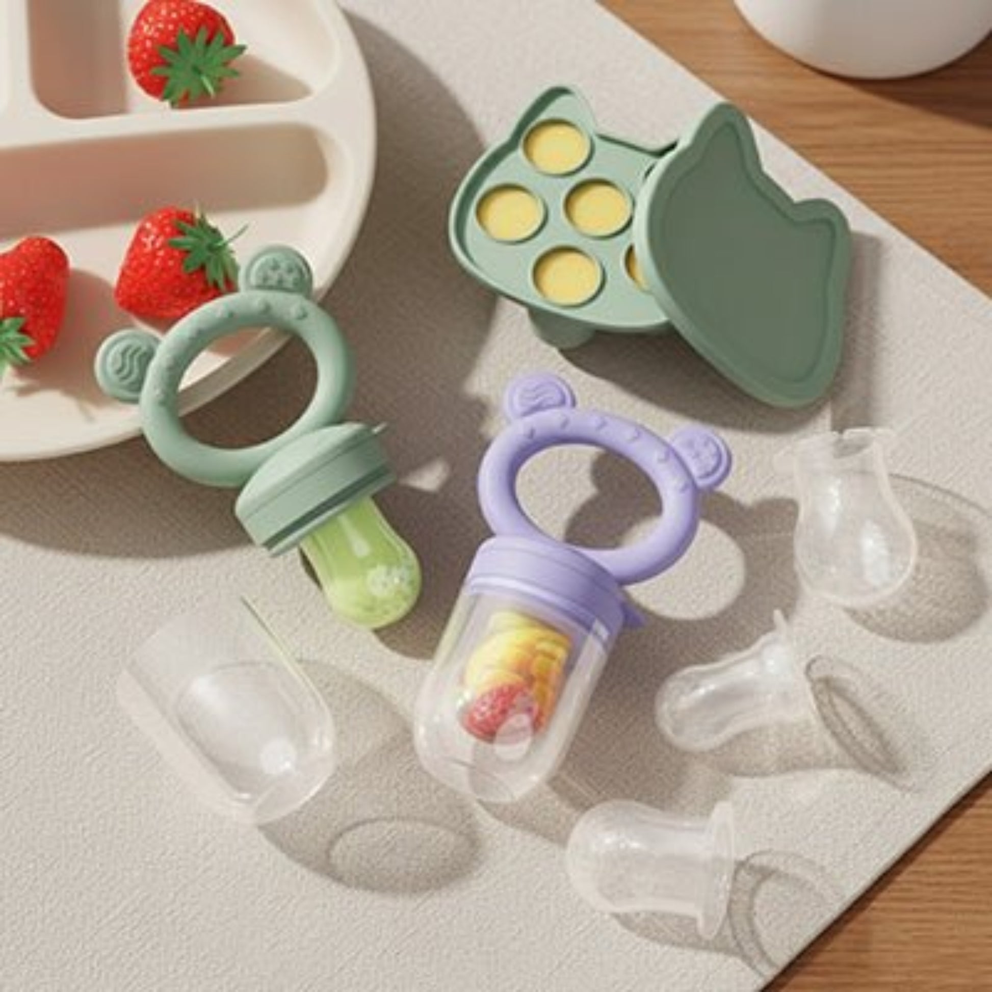 grignoteuse bebe remplies de fruits frais  ou glacés
