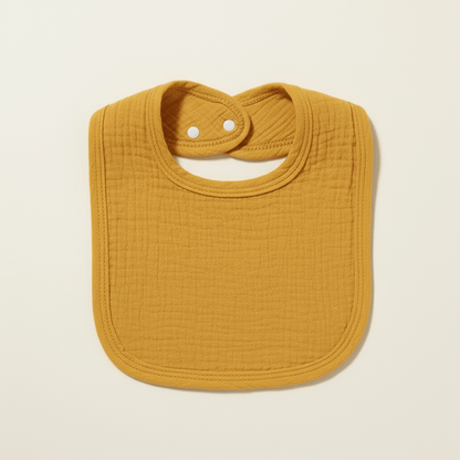 présentaton du bavoir en coton absorbant jaune moutarde