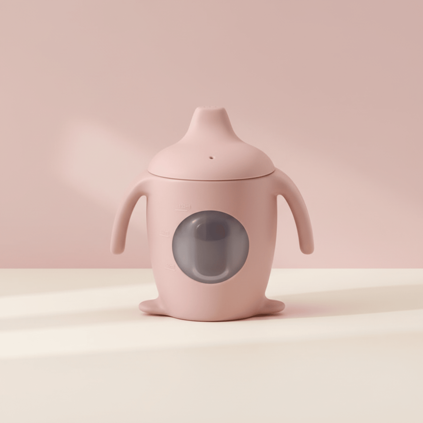 présentation de la tasse d'apprentissage bebe avec hublot coloris rose clair