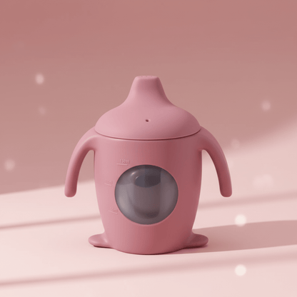 présentation de la tasse d'apprentissage bebe avec hublot coloris rose foncé